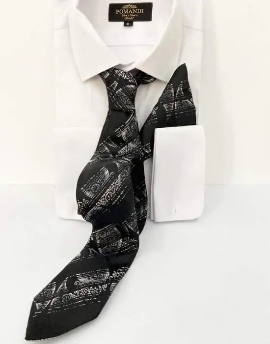 Chemise blanche avec cravate noire à motifs